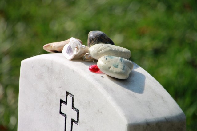 Stones atop Arlington National grave